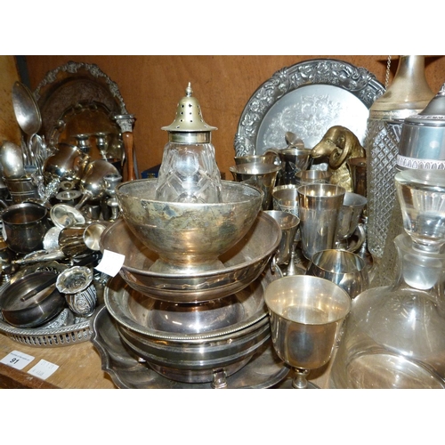 91 - A large quantity of silver plated ware to include carafes, decanters, trays, goblets, coffee spoons ... 