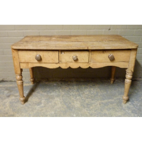 147 - A Victorian pine side table the rectangular top with rounded front corners above one short central d... 