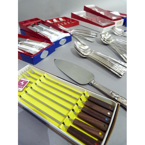 18 - A part suite EPNS community plate cutlery in boxes comprising, six table knives, six table forks, si... 