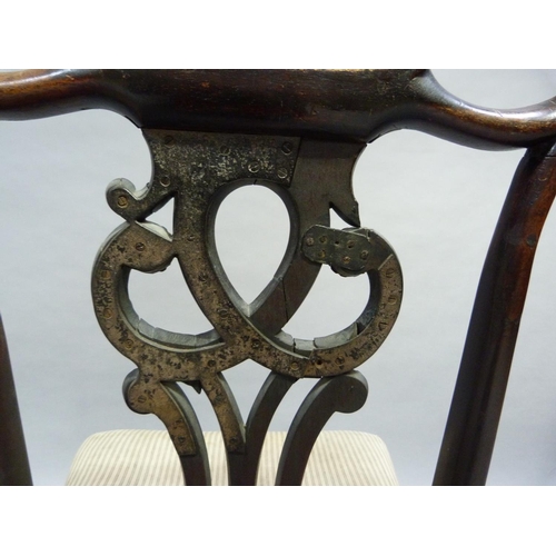 325 - An C18th mahogany single chair having a shaped top rail, interlaced pierced splat, carved with leaf ... 