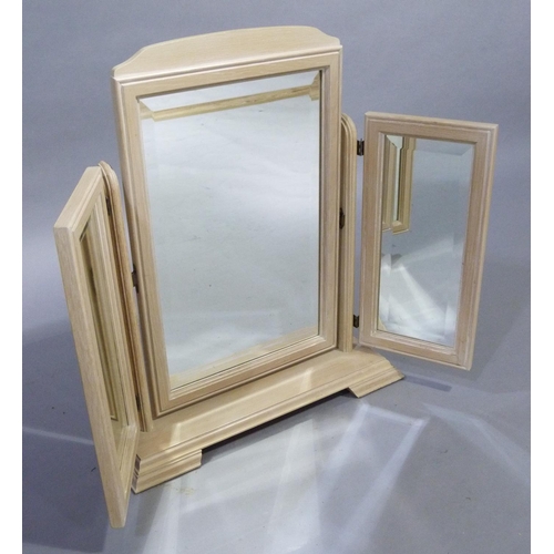 334 - A bleached oak triple dressing table mirror