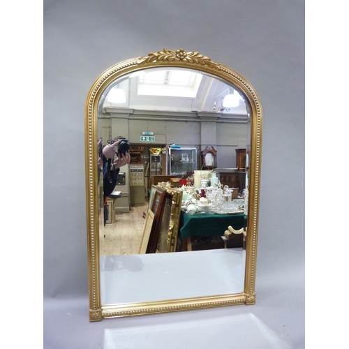 355 - A Victorian style gilt wall mirror, arched profile with foliate cresting and beaded frame, the glas ... 