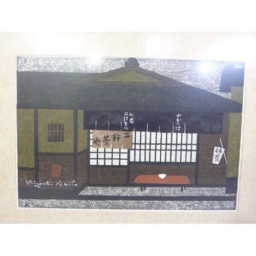 254 - A modern japanese wood cut of a tea house signed within the plate, 27cm x 39cm