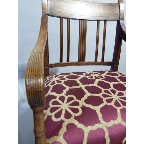 106 - A George III style oak dining chair with pierced waisted splat, drop in seat, on chamfered square le... 