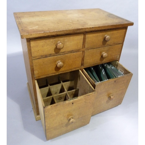 291 - An oak chest of four short drawers and two deep drawers all with turned handles and on later plinth ... 