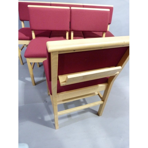 295 - A set of six beech framed single chairs upholstered in crimson to the back and seat, each with a boo... 