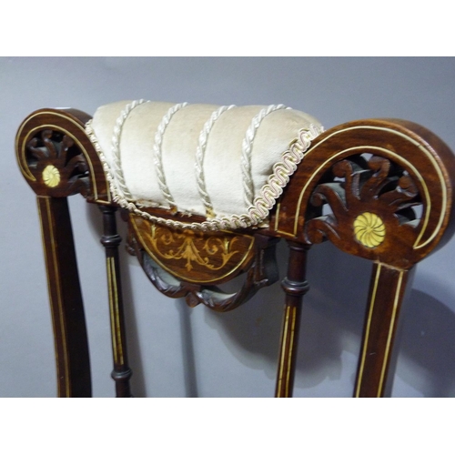 297 - A late Victorian rosewood and ivorine inlaid nursing chair having a partially upholstered top rail a... 