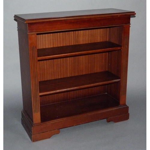 300 - A set of Cherrywood effect bookshelves on bracket feet measuring 90cm x 97cm