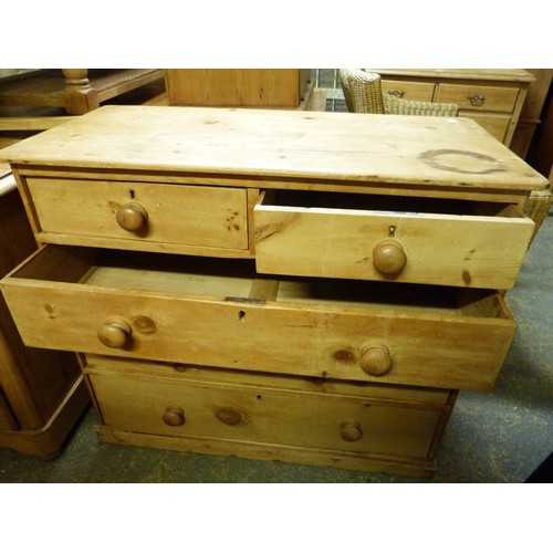 146 - A Victorian pine chest of drawers, the rectangular top above two short and three long drawers, skirt... 