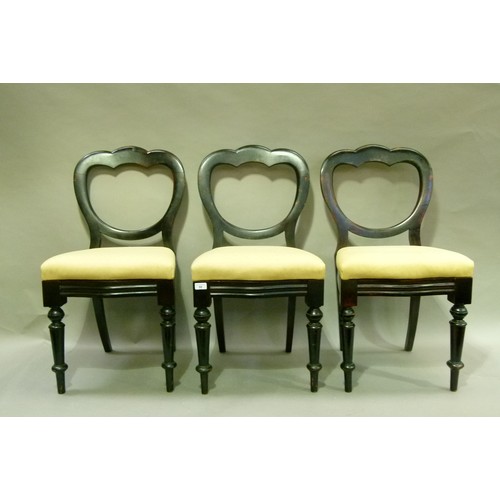 98 - A set of three mahogany stained chairs