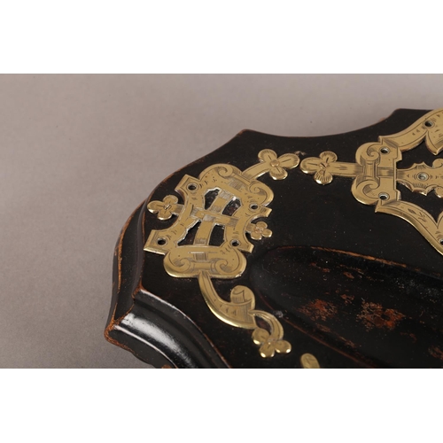 9 - A Victorian ebonised and cut brass strapwork desk standish fitted with a hobnail cut glass inkwell o... 