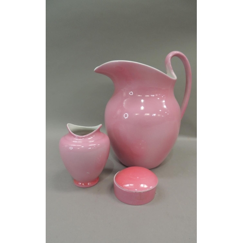 18 - An early 20th century pink glazed toilet jug, vase, soap dish and cover