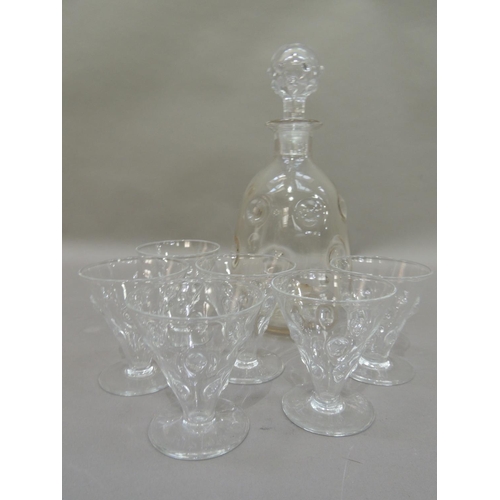 20 - A glass decanter and six glasses of pulled decoration, the decanter 26cm high
