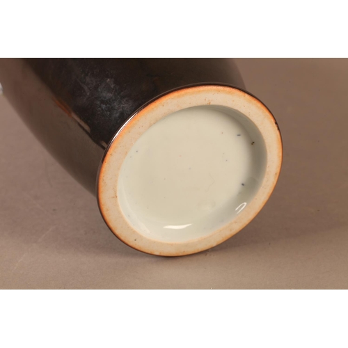 2 - A Chinese vase of tapered form, the dark brown ground, moulded and painted with a prunus tree and wh... 