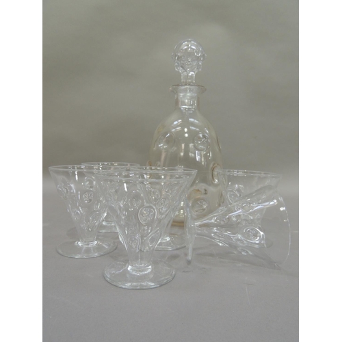 20 - A glass decanter and six glasses of pulled decoration, the decanter 26cm high