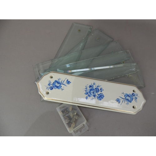 24 - Five vintage bevelled glass door plates with faceted screw heads together with a later blue and whit... 
