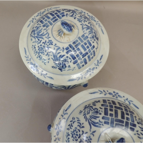 28 - A pair of Chinese blue and white jars and covers decorated with geometric panels with stylised flowe... 