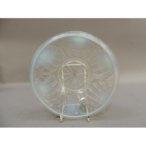 42 - An English opalescent glass bowl, moulded in relief with stylised shells, 20cm diameter, indistinct ... 