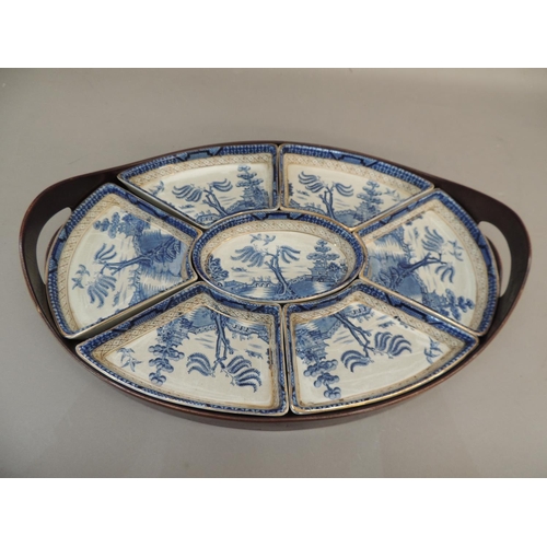 53 - A Booths Real Old Willow pottery tray with segmental sections contained within a wooden two handled ... 