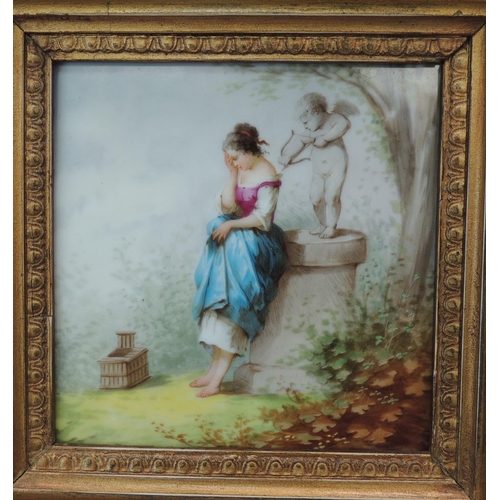 58 - A continental square panel painted with a young woman standing before a pillar with cupid and his bo... 