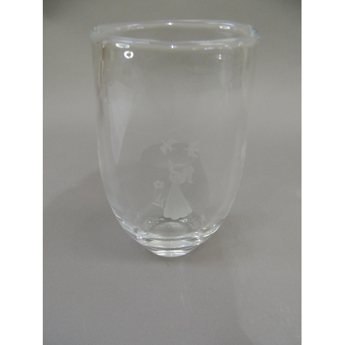 56 - A Scandinavian glass vase of flattened oval form etched with a girl and birds, indistinctly signed t... 