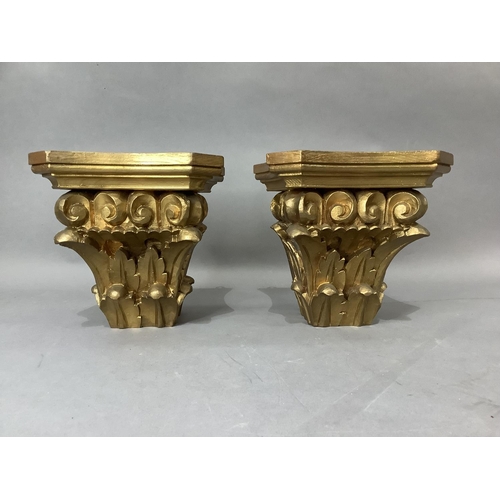 10 - A pair of giltwood wall brackets of leaf and scroll capitol design, height 18.5cm