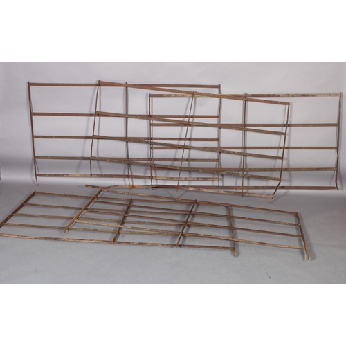 180 - Four cast iron five-bar estate railings and one with four bars, approximately 183cm wide x 106cm hig... 