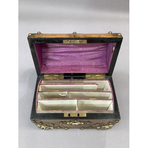 15 - A Victorian figured walnut dome-topped stationery box with cut gilded brass and ivory work, interior... 
