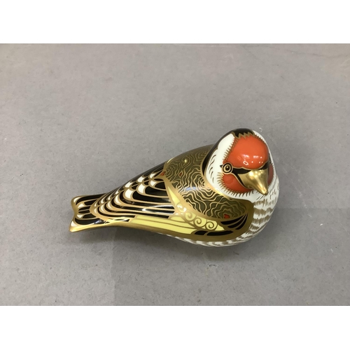 23 - A Royal Crown Derby paperweight goldfinch with gold button to underside