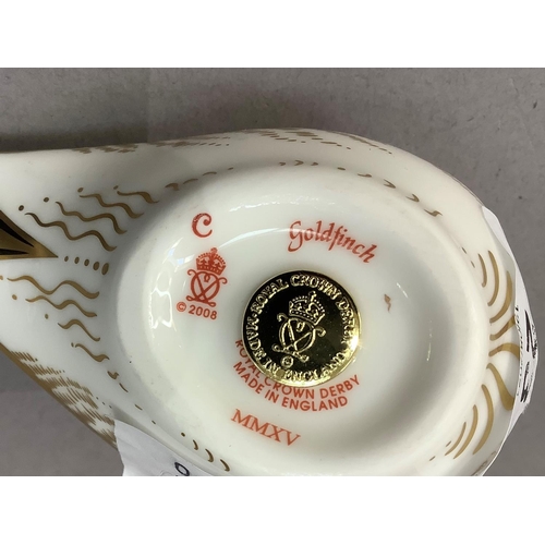 23 - A Royal Crown Derby paperweight goldfinch with gold button to underside