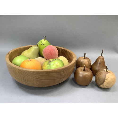 39 - A turned beech bowl by Sam O'Neill, together with a turned yew wood apple and pear, a spalted beech ... 