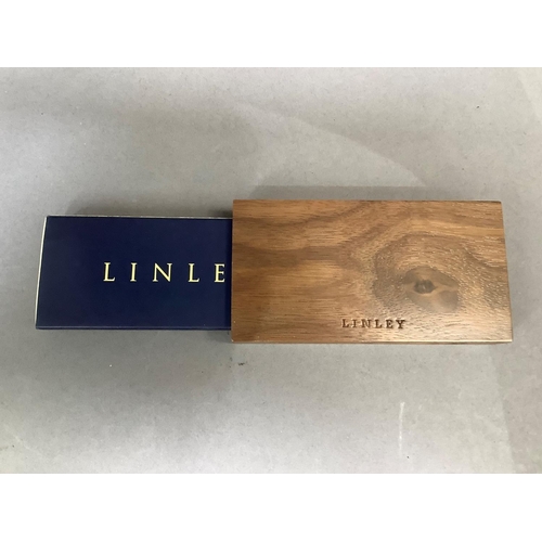 5 - A David Linley matchbox case, inset with a silver plaque and containing a box of Linley matches, unu... 