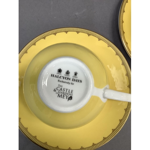 37 - A pair of Halycon Days cups and saucers for Castle Mey and a Russian China blue white and gilt teapo... 