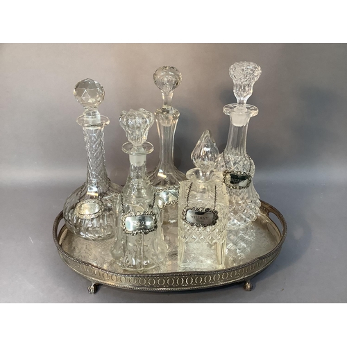 65 - Five various glass decanters of cut and etched design, each with a modern silver spirit label togeth... 