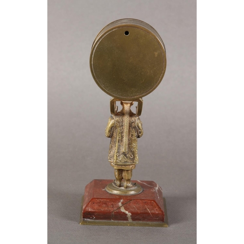 8 - A late 19th century gilt-brass desk barometer, the drum casing held aloft by the figure of a China m... 