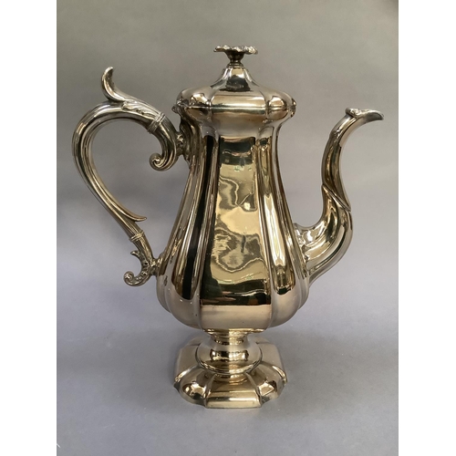 29 - A silver plated coffee pot by James Dixon and Son of panelled baluster form having a domed cover wit... 