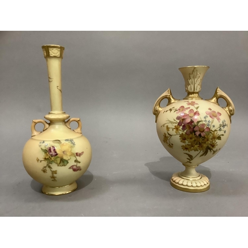 44 - A Royal Worcester two handled vase having a trumpet shaped neck and ovoid body with handles to the s... 