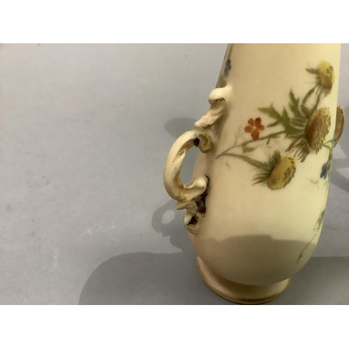 46 - A Royal Worcester jug having an antler shaped handle, printed and painted with sprays of flowers and... 