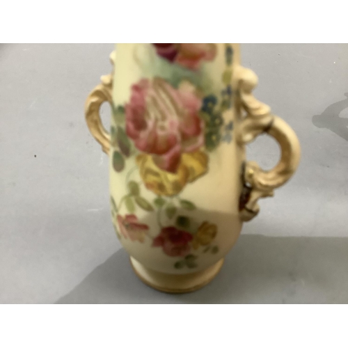 46 - A Royal Worcester jug having an antler shaped handle, printed and painted with sprays of flowers and... 