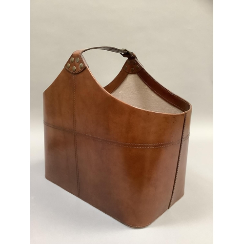 178 - A tan leather magazine bag