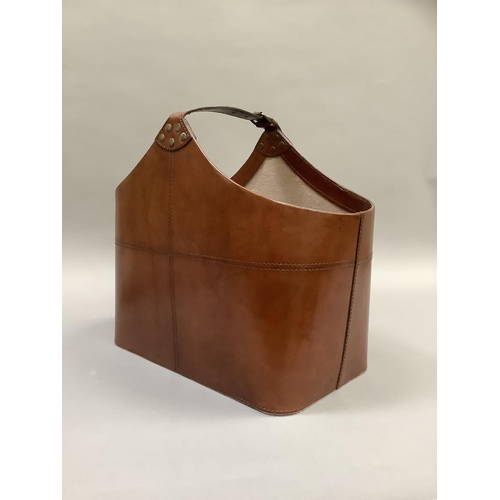 178 - A tan leather magazine bag