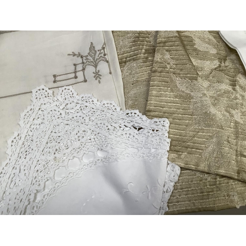 177 - A quantity of table linens embroidered crocheted etc together with a circular cloth with tassel frin... 