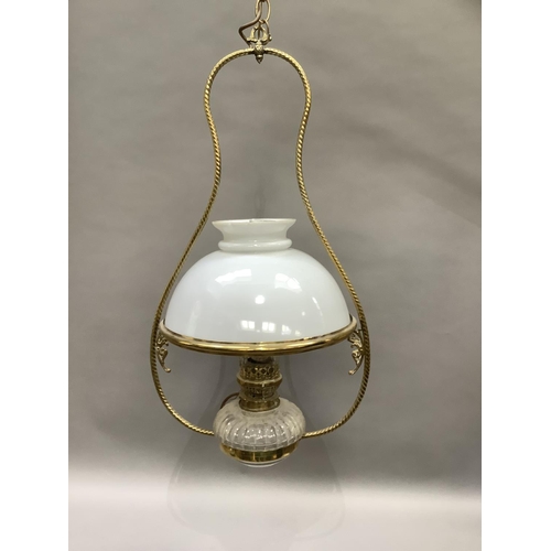 364 - A late Victorian hanging lantern having a clear glass reservoir and white glass shade, approximately... 