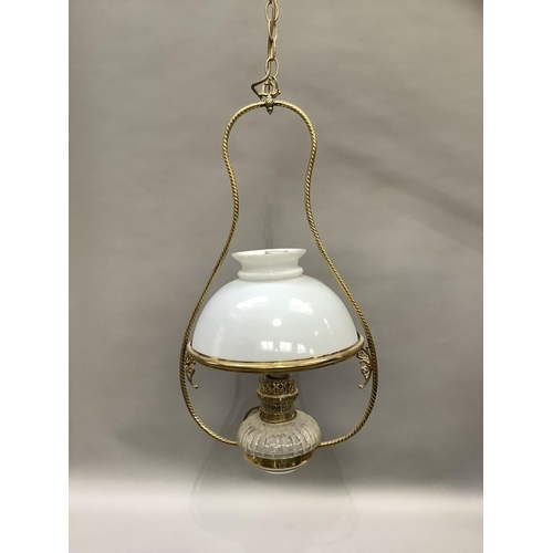 364 - A late Victorian hanging lantern having a clear glass reservoir and white glass shade, approximately... 