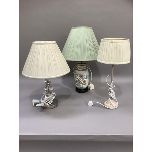 180 - A Chinoiserie pottery table lamp with hardwood integral base and pale green pleated shade together w... 