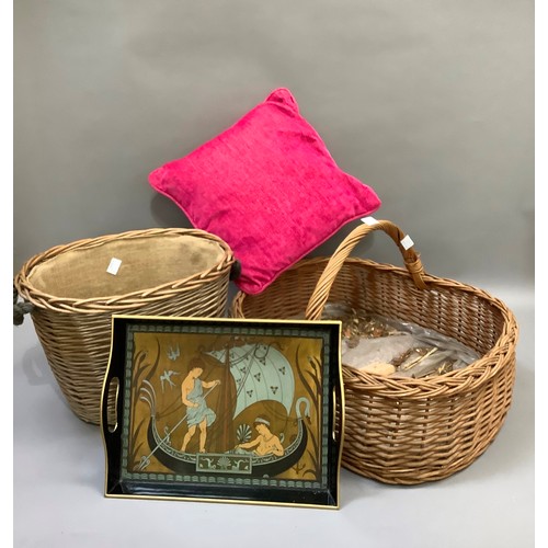 182 - Two wicker log baskets, a two handled tray and two raspberry coloured scatter cushions