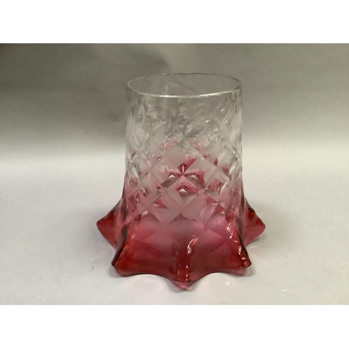 31 - A Victorian cranberry tinted and etched light shade with folded rim and diamond quilted moulded body... 