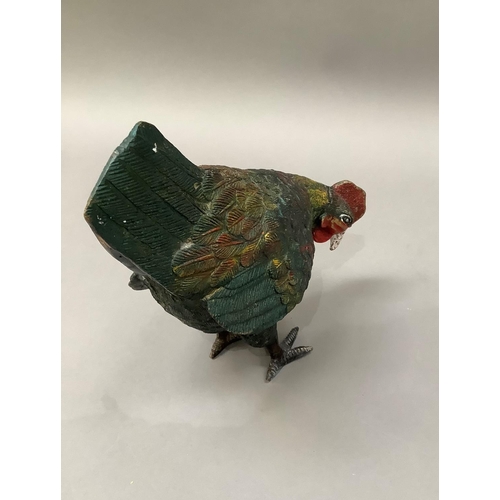 1 - A cold painted metal cockerel and hen, 29cm high