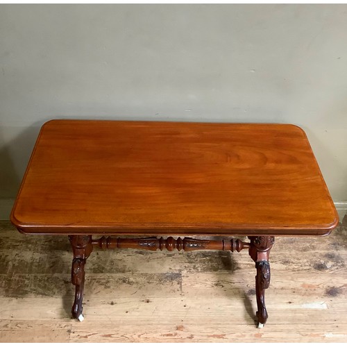 361 - A Victorian mahogany window table, rectangular on leaf carved refectory standards joined by conformi... 