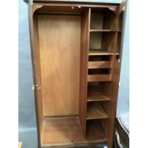 177 - A Stag Minstrel two door wardrobe, 97cm wide by 176cm high